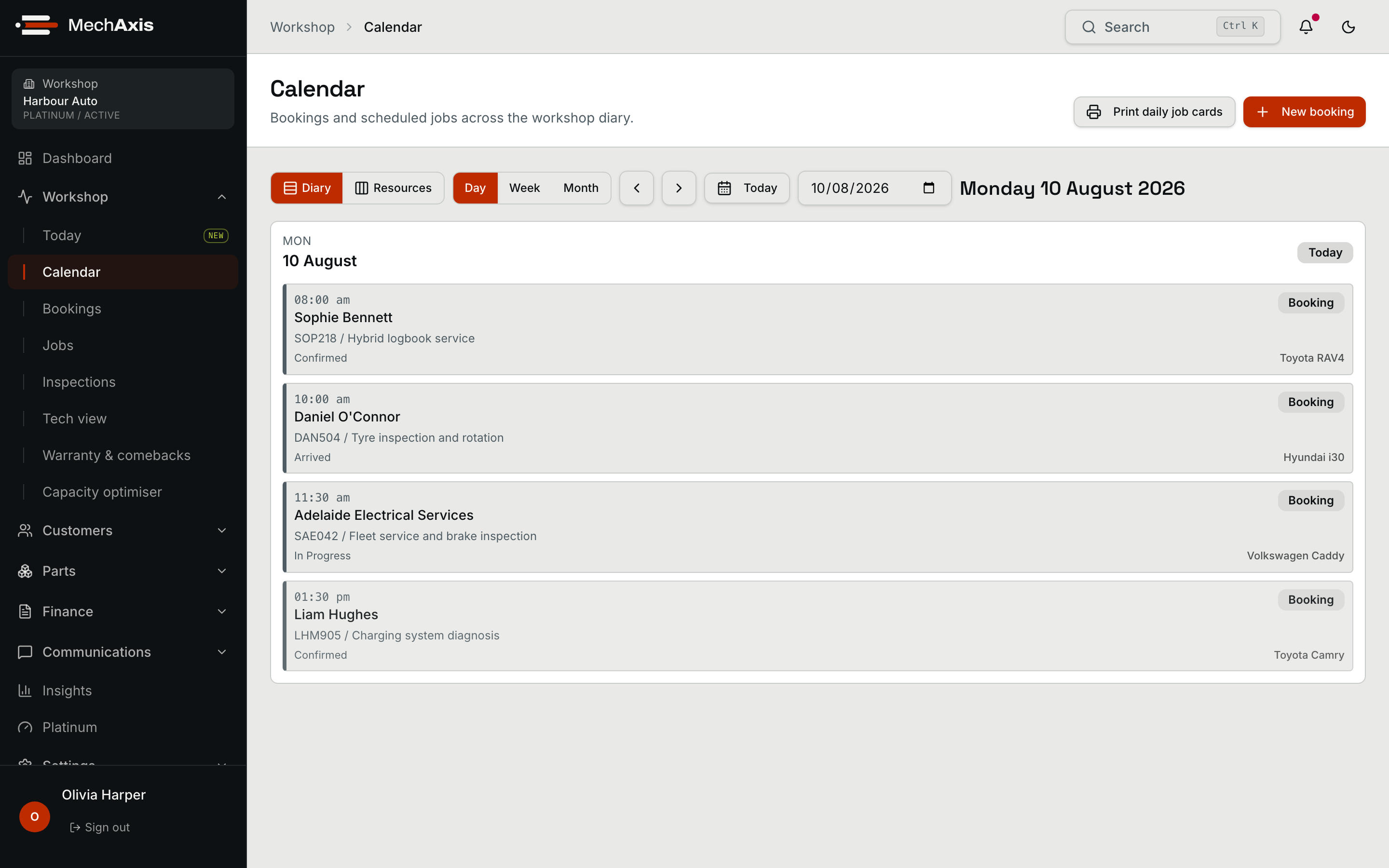 Populated MechAxis workshop calendar showing bookings and live jobs across the day